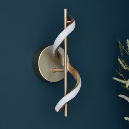 e0b0b9bb350b1667f085719ed5c1e585964e6df3e344a2297dbb7c9c67638ca1.jpg An Image of Shore Light Caliso Metal LED Wall Light - Gold