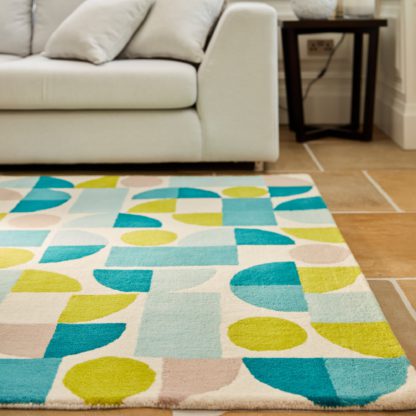 e92101f70fa2c3dd4a07d78c50ccde47ea6c7c9c430c1cd48294b2a67ba7253c.jpg An Image of Bauhaus Abstract Blue Rug Blue