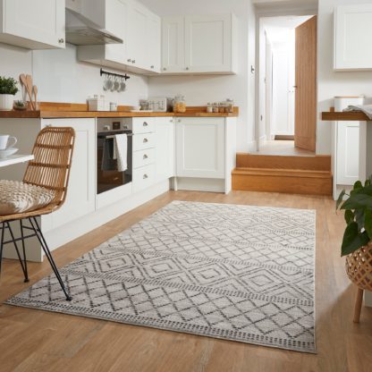 9c911c1a3efa50f276ce4c1d9aef54fec702448843eada3ad77163009a2481a1.jpg An Image of Sadie Washable Rug Millie Monochrome