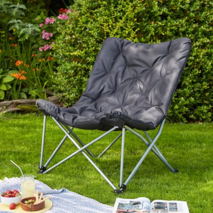 9d7b264dfa73ec91b26a1763994932defce0a97e49c19ea5ea6aa74bce1f93ab.jpg An Image of Padded Butterfly Chair, Tropical Print Multi Coloured