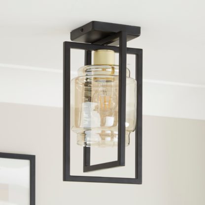 a339881b0f46c7a3bd5864a53ca57c839dbecb66771377b53a5e2782e6431a28.jpg An Image of Seattle Industrial Flush Ceiling Light Black