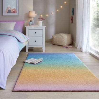 bb368b9b8c85e296cc29dd1867ba6b816d3b17b20814c72b3a8c01a183d69176.jpg An Image of Ombre Horizontal Supersoft Faux Fur Rug MultiColoured