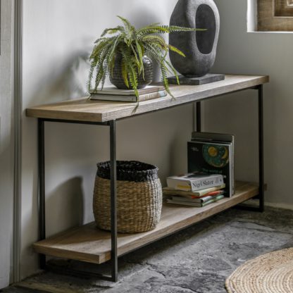 e06b538e390a84965c7af3bf73225e3beff2ac68eb6cc43289f9a81ce632c46c.jpg An Image of Beacon Display Table Light Wood
