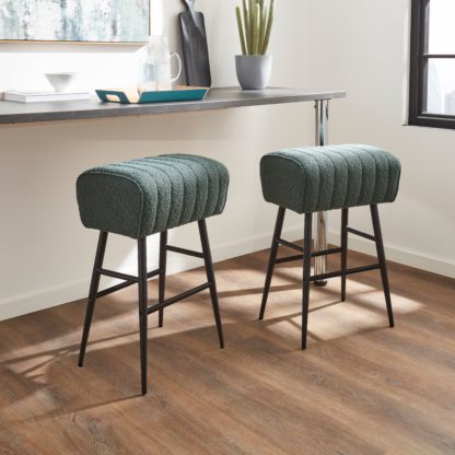 0d6dcb6f5b79235e4e6396bcc7d500332803c5a160846906621de2039c18a5d9.jpg An Image of Bude Bar Stool, Boucle Mushroom
