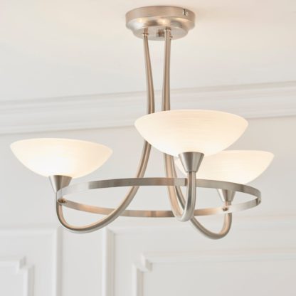 0ed4d0452a5a7698d7e174a496a5d7f9bea84cadccc04eb5a2591dd354e2cb01.jpg An Image of Vogue Cagney 3 Light Semi Flush Ceiling Fitting Chrome Silver