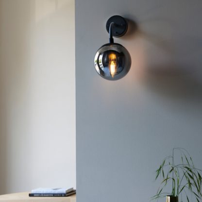 150bf6c5b10bfc0d45b2ceee158de177c5981123da3057cbbd394cfe1e2fa08d.jpg An Image of Vogue Newton Wall Light Matt Black