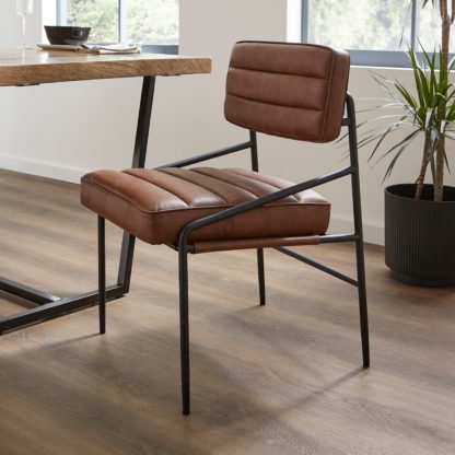 47fb21949c093f10674faafb685840bab528823314769f9eeb82596c8d203c8e.jpg An Image of Bude Dining Chair, Faux Leather Brown