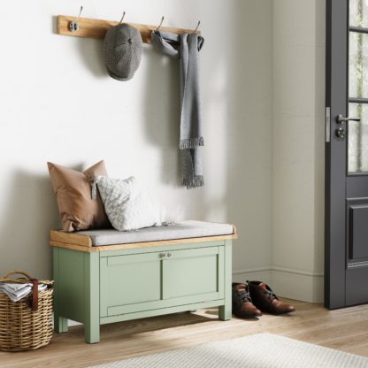 27e55a4a3be7a438892ba23d659acd17fc674ca648d8abee6eea9273b633e9b8.jpg An Image of Bromley Storage Bench With Cushion Sage (Green)