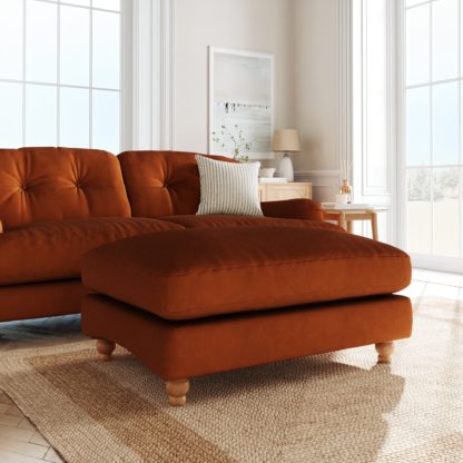 28fc66ab5d6aa435ef6e990d92a81aa31951d70ee8a37acbf76cc2177109b290.jpg An Image of Martha Matte Plush Velvet Footstool Matte Plush Velvet Bright Coral