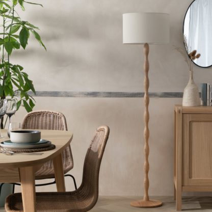 430aaf1cab44fc00d76ff187342a9c65c8452348c41db45f370436ec874bc9a3.jpg An Image of Habitat Bobbin Stick Floor Lamp - Natural