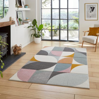 4c75e1e68a89a2d9a43bb32007d4bbf9629c26ccaf0e7da2fad5332a632dbeca.jpg An Image of Matrix Geometric Rug MultiColoured