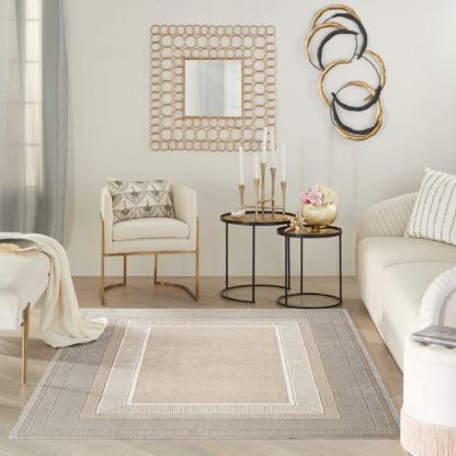 d5986a26b09e1a55e1551cc993a1ea4ac355c80ae6ee350f51aadf584a6df130.jpg An Image of Glitz Velvet Rug Beige