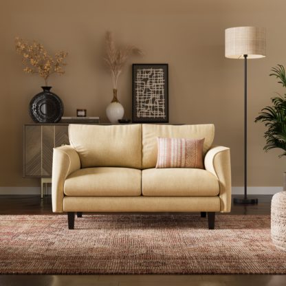 3b6adf47a7a602ed765099dce25010787e74e8b7450e997278a7f09bf8272ec3.jpg An Image of Darla Curved Faux Linen KD Sofa 2 Seater Honey