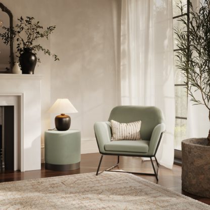 a9b9d2f2f49f0876848727472b9033b474fd8a24ad15ccdd50ba1a2440d23c2e.jpg An Image of Lara Velvet Pouffe Sage (Green)