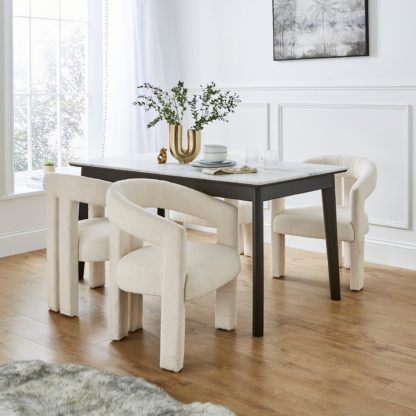 b65c4d4ec3948733f78f793d4c81a631403246474170afaeacc0b4440593c0fe.jpg An Image of Tervola Rectangular Dining Table with Lucilla Orange Umber Boucle Dining Chairs