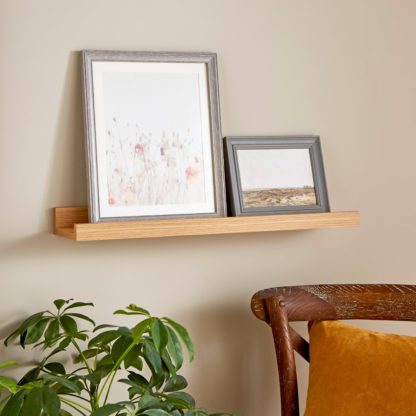 bac33384bdfee5e128bbf2fe4bf5a4391dcd4348b2c2f09708d18e03ffc3e3ca.jpg An Image of 60cm Picture Ledge Brown