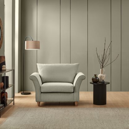 be480cabd720cc285a17f4da4d0de5ab29fd244e73f06dc72aff351296d5215e.jpg An Image of Dixie Armchair, Soft Texture Fabric Soft Green