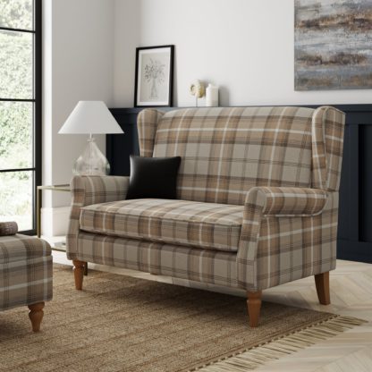 c9f835f23ed5370b5c10c5a8dee25b4eb6e5a5e7d3a295ede1d28a98ca327203.jpg An Image of Oswald Small 2 Seater Sofa Navy Blue
