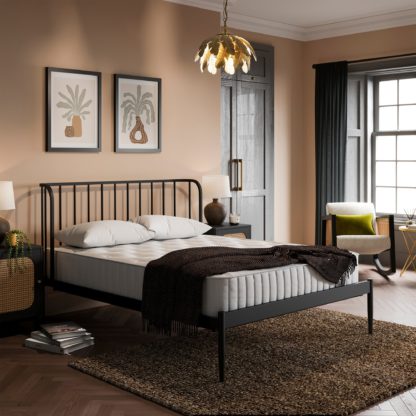 e18304c95e22a8b1ce2a2adf98fccce530b6fbc947ecf67245d8123f5e14d97c.jpg An Image of Elliot Curved Spindle Bed Black