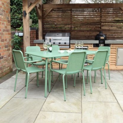 e75d397c2797b3f062e824afce943f1fe288f95f3ac9462bc96b1cf29bea3b97.jpg An Image of Porto 6 Seater Round Dining Set with Stacking Chairs Olive