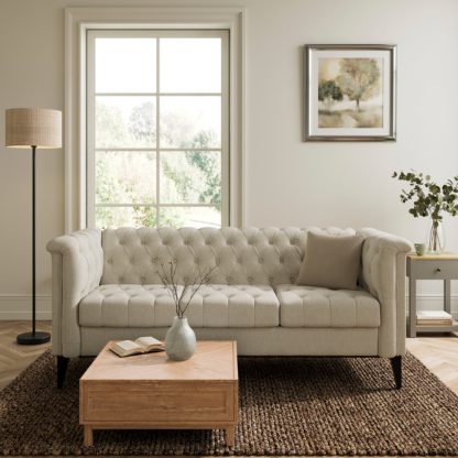 e97a4ac930a0fbeb024742ffd6df6eca617bf2e30fd74e2ad00cb042b70d5509.jpg An Image of Nellie Faux Linen Buttoned 3 Seater Sofa Natural