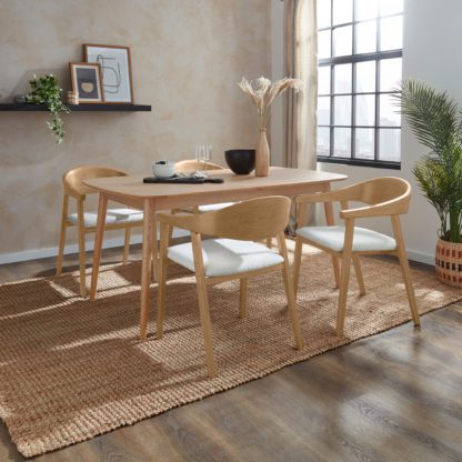 ffd7831071afff315eb1608a4ce40370481ea94876a4f8dd4b6db500593fc034.jpg An Image of Karla Rectangular Extendable Dining Table with Oskar Black Stained Ivory Boucle Dining Chairs