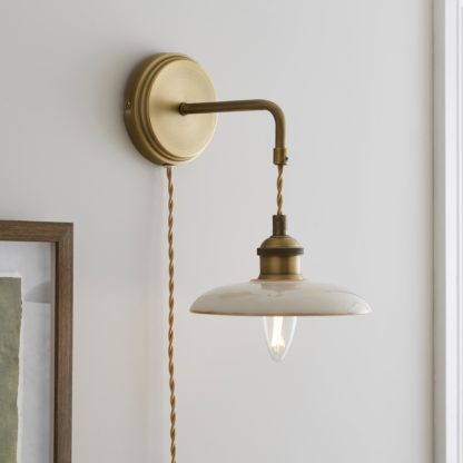 642078cf15b2aaf9ff321a1d9b9859249d2d10259b52cc01059748405e26b70b.jpg An Image of Churchgate Fawsley Fern Industrial Plug In Wall Light Off-White