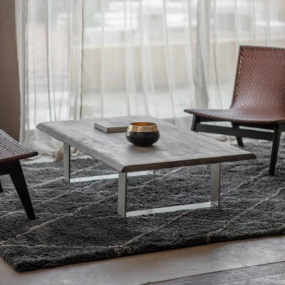 83cbd5ab6e83fe0c2f1f7b14289572c86ccf210f1082b4cb6aef2bc37655d09f.jpg An Image of Guldeford Coffee Table Natural