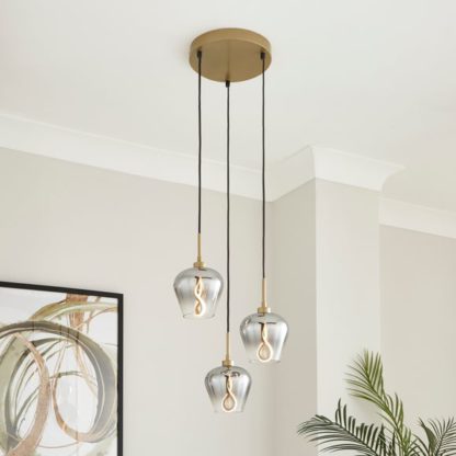1aa92acd2720de451779f058840e5d14698207d62cd5de241371a10674a8d9fa.jpg An Image of Aurora 3 Light LED Cluster Ceiling Light