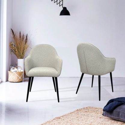 1f102950f0e44d61de40c908fc0754be589b5197352d25e8b91a2e5adaef00af.jpg An Image of Indus Valley Set of 2 Boucle Dining Chairs