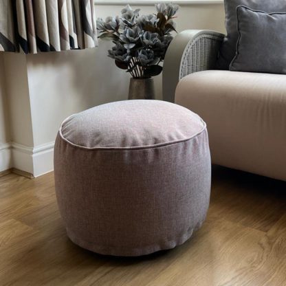 394e3f7c9ddceaff408db5c04252c70c8ae6eeb09be27ae60616764bd2b511f2.jpg An Image of Daro Spi Round Pouffe