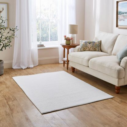 3ba17663a1b48a7e1f4fbfef76f2ea8170900b235cee74fba1beb7e5d00d82ff.jpg An Image of Mason Boucle Rug