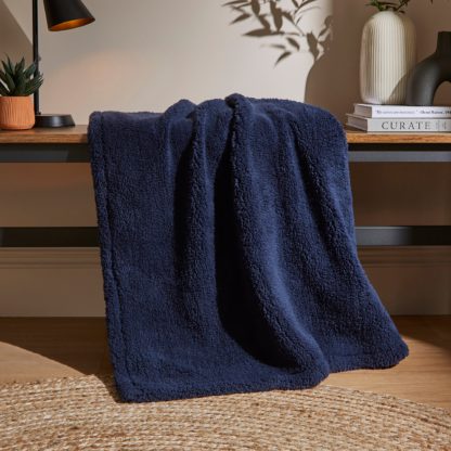 3ecc4f51ee1d9ca0e191601f57565bddd03d6c3164384e0e5dc7d35cea0965ec.jpg An Image of Jersey Teddy Throw 130cm x 180cm Navy (Blue)