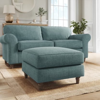 4f5229c3daa5ac1f75aba9217f9e2d58df2d5222418edacb6b339b2be1544ee9.jpg An Image of Flori Tonal Plush Chenille Footstool