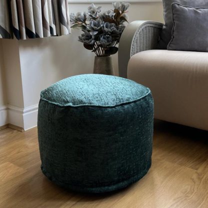 52d714a057c7d54c343b9b18b0c3b70e7a3aa784fe4d9a3c965b84b05192f5a3.jpg An Image of Daro Alex Round Pouffe