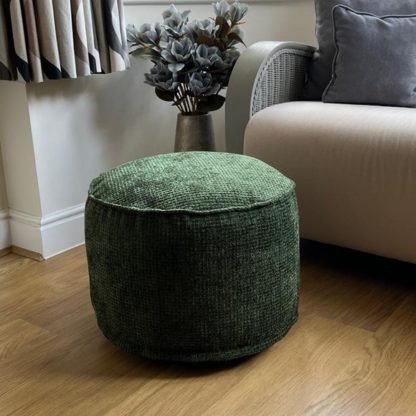 5ea838b1ae389ecda955c8765606724e4f6f22189173632148d338294c2da355.jpg An Image of Daro Waffle Round Pouffe