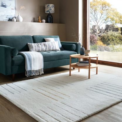 614b056bf8b45b64fdd59b050b39729aaedc659ecc3ed5e7d9611ce0022fa01b.jpg An Image of Dottie Geometric Wool Rug