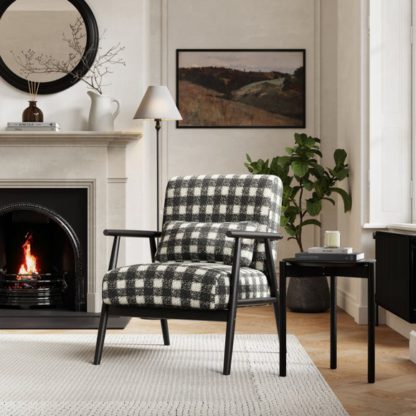 6b0d08297094c42009104da185e47375caeee25961611d2e94a2277c77552edf.jpg An Image of Alpine Boucle Spindle Accent Chair