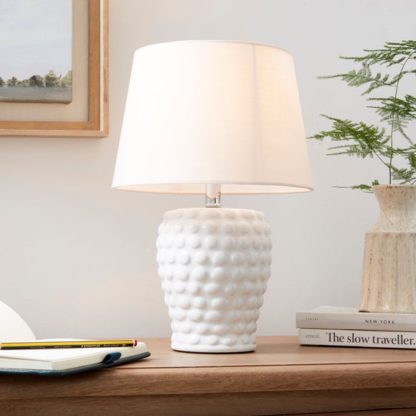 711025c587eed48c032e2d3dd534386e6f99e2b2b84da3d184a14ebcf7565651.jpg An Image of Bobble Ceramic Table Lamp