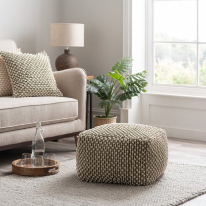74663794a02c1ff8472b35205a40766783c7f250414dc60fcce0d8679dc6e7db.jpg An Image of Jersey Bobble Pouffe