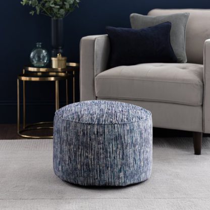 7502786918cdb86f1af92fd1ff1ac5f7e0b352e1c50bc6668fccd3d27bb0faff.jpg An Image of Reva Stripe Pouffe