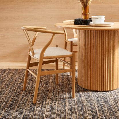 8bc9d48ea94e08cb37d25573c6e089e1645f52fe211960a5c0cb858da6cdc9fb.jpg An Image of Lara Dining Chair, Boucle