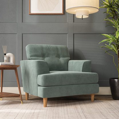 8be3deacb1d9cc04ba7fb60074566d8564daf5e50a65b652f53aeb3d00c78f2b.jpg An Image of Cooper Armchair