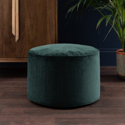 9041edbbd973cc3252a170b4d80049a2841d717cbb33eb9135b289c5965f715b.jpg An Image of Eliza Velvet Pouffe