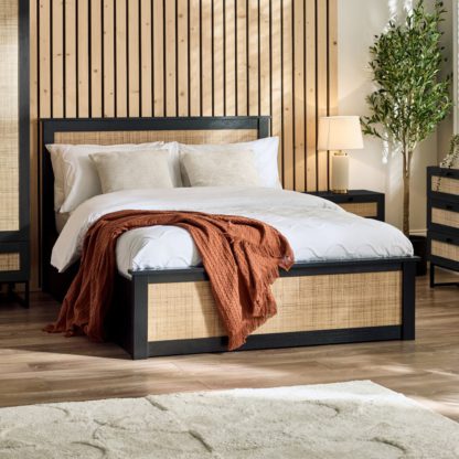9f988d9f8f34c4b8d22532f7c67ef9cfe893b28c575b62c1140db5f11b07375a.jpg An Image of Padstow - Double - Rattan Ottoman Storage Bed - Black - Wooden - 4ft6 - Happy Beds