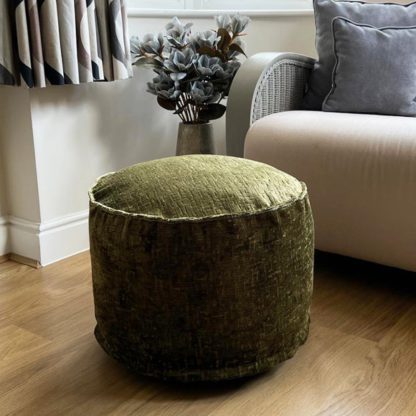 a0ec7ce2681c33b9907769c8aee0adc35466bc71e1d702dc849ab15b44a67609.jpg An Image of Daro Alex Round Pouffe