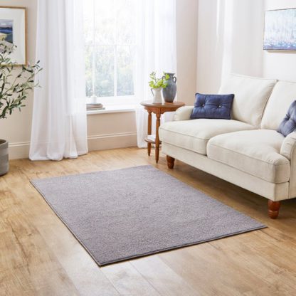 a1922422e2299053382f0045be924f7c5893b8f33f7e7b9da49d5974b269569d.jpg An Image of Mason Boucle Rug