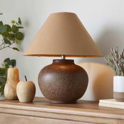 a2dcf28430edcf319d1e0be25c69f3452de8cb38ebb18fca127e2dcc6b88ede6.jpg An Image of Sandi Ceramic Table Lamp