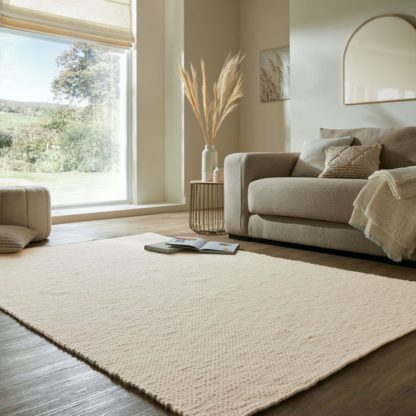 af8fdcac7cfc24f93228772524cfb8c49a14b257834e8f0d08ba3bf4d485318b.jpg An Image of Chunky Wool Weave Rug
