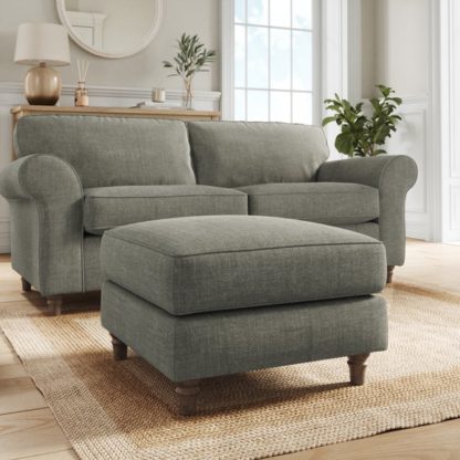 b46ac63cfb6e72bd1d0fd5147fc49e6bcaeed3e864e41f3d3d17a86c4e755f06.jpg An Image of Flori Tonal Plush Chenille Footstool